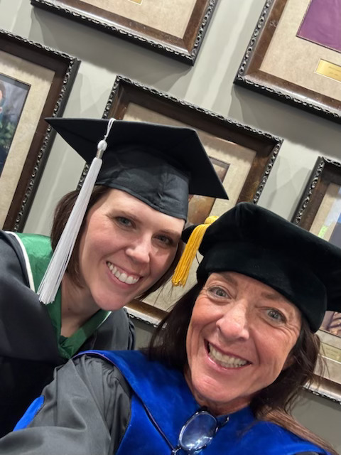 Lisa and Terina at their Hooding Ceremony