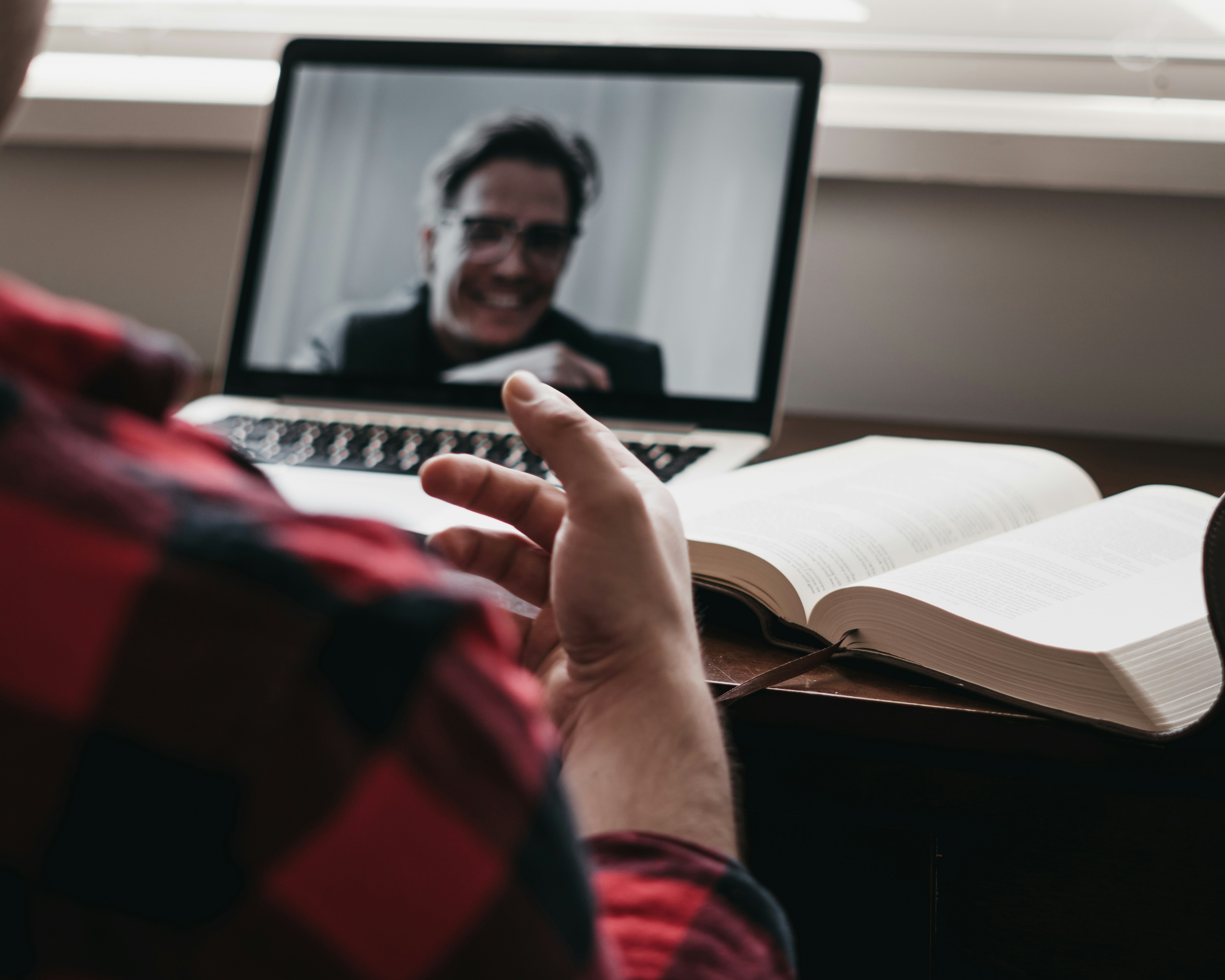 A person on a telehealth session